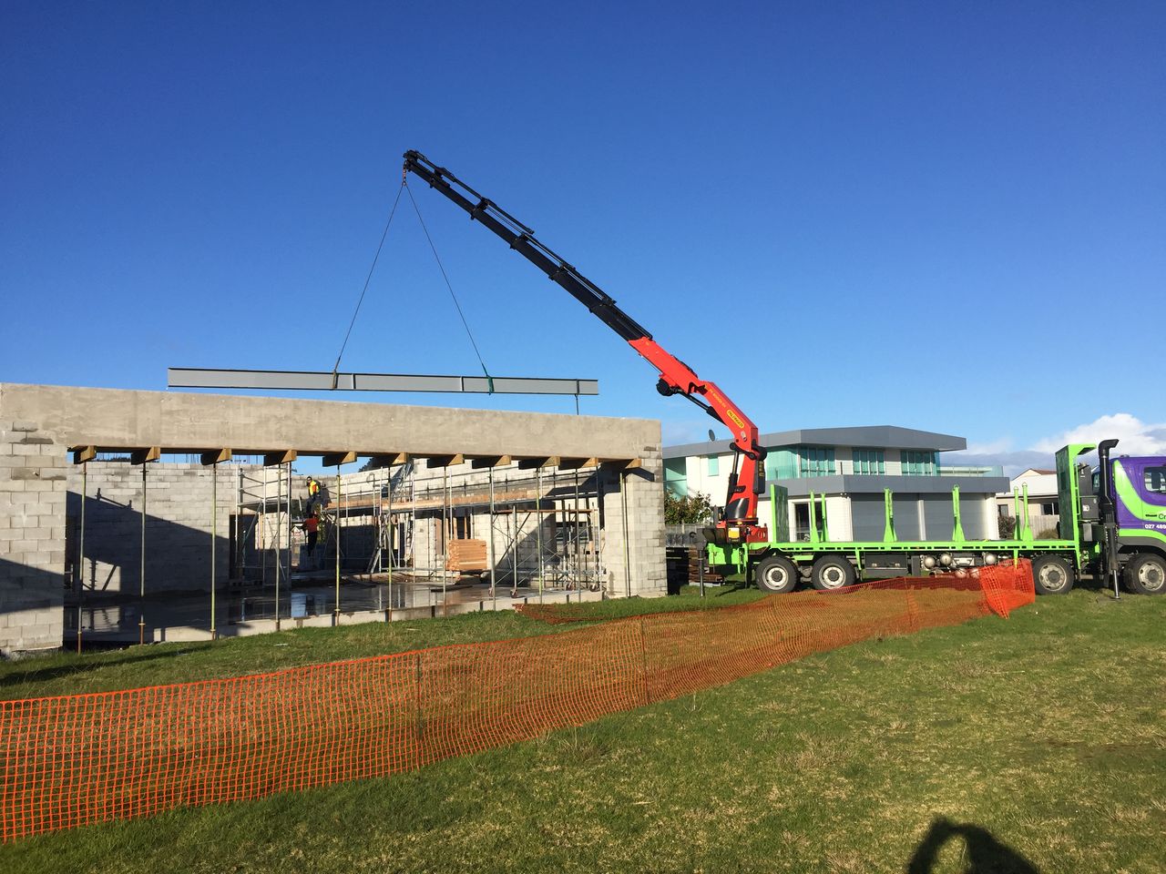 Working over the structure from the roadside.