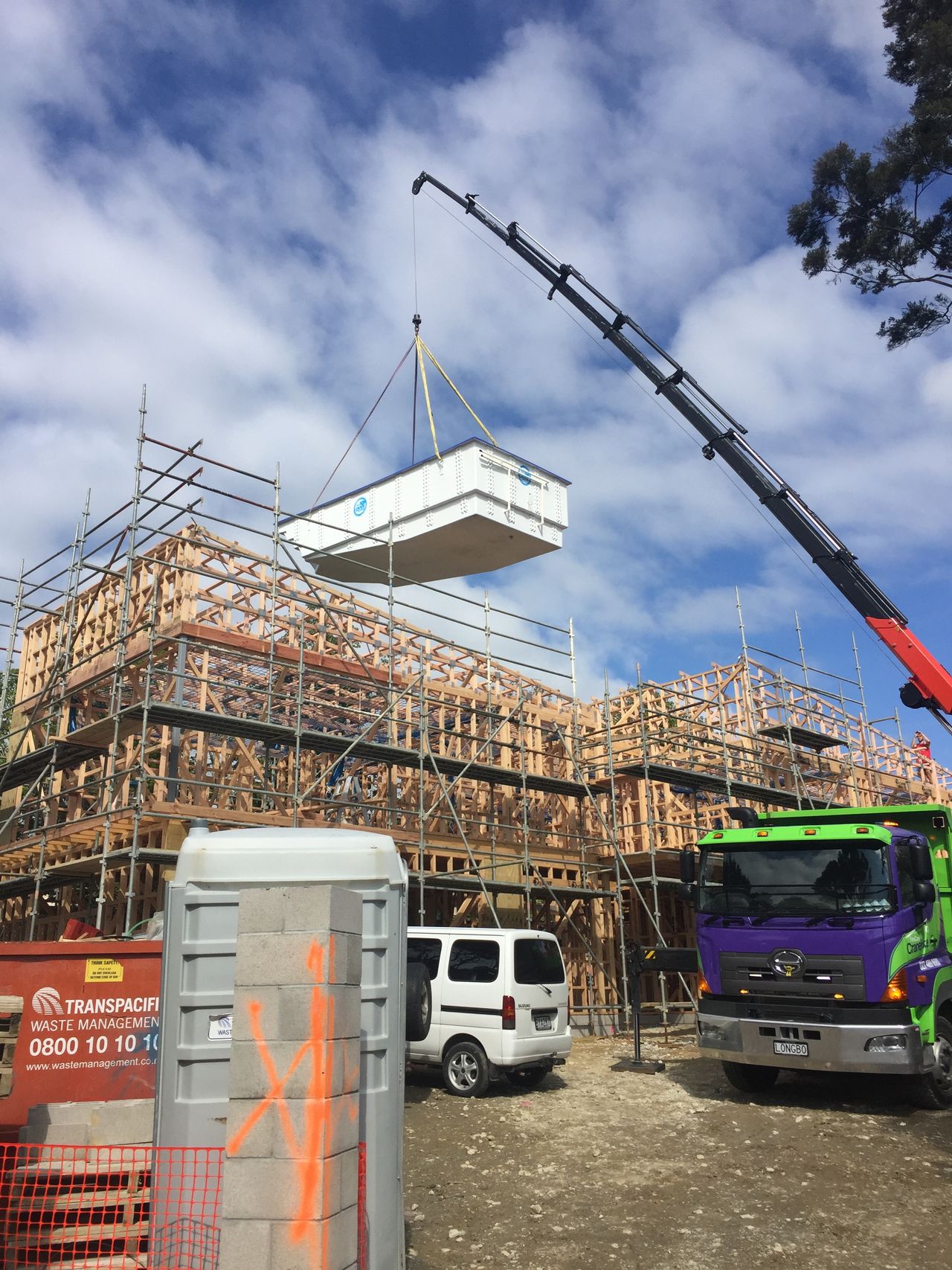 A panel lifted above the scaffold.