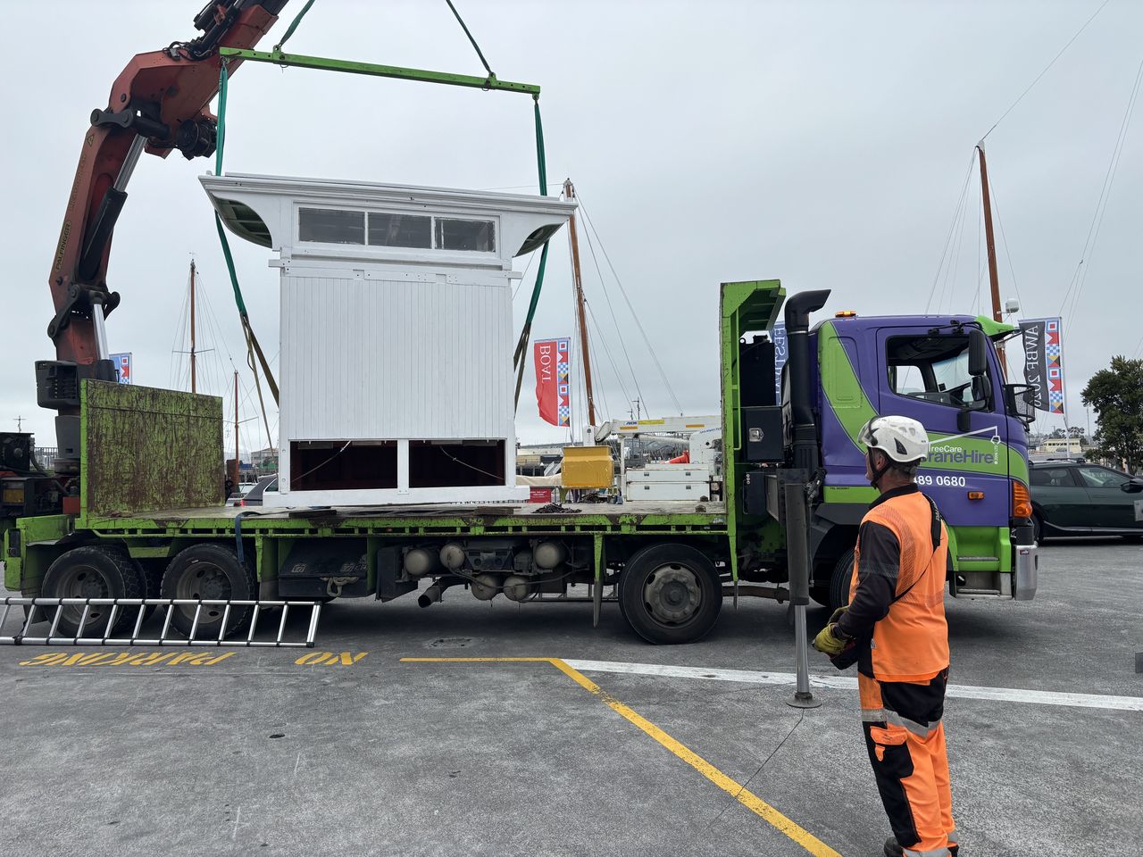Guiding a cabin into its final position.