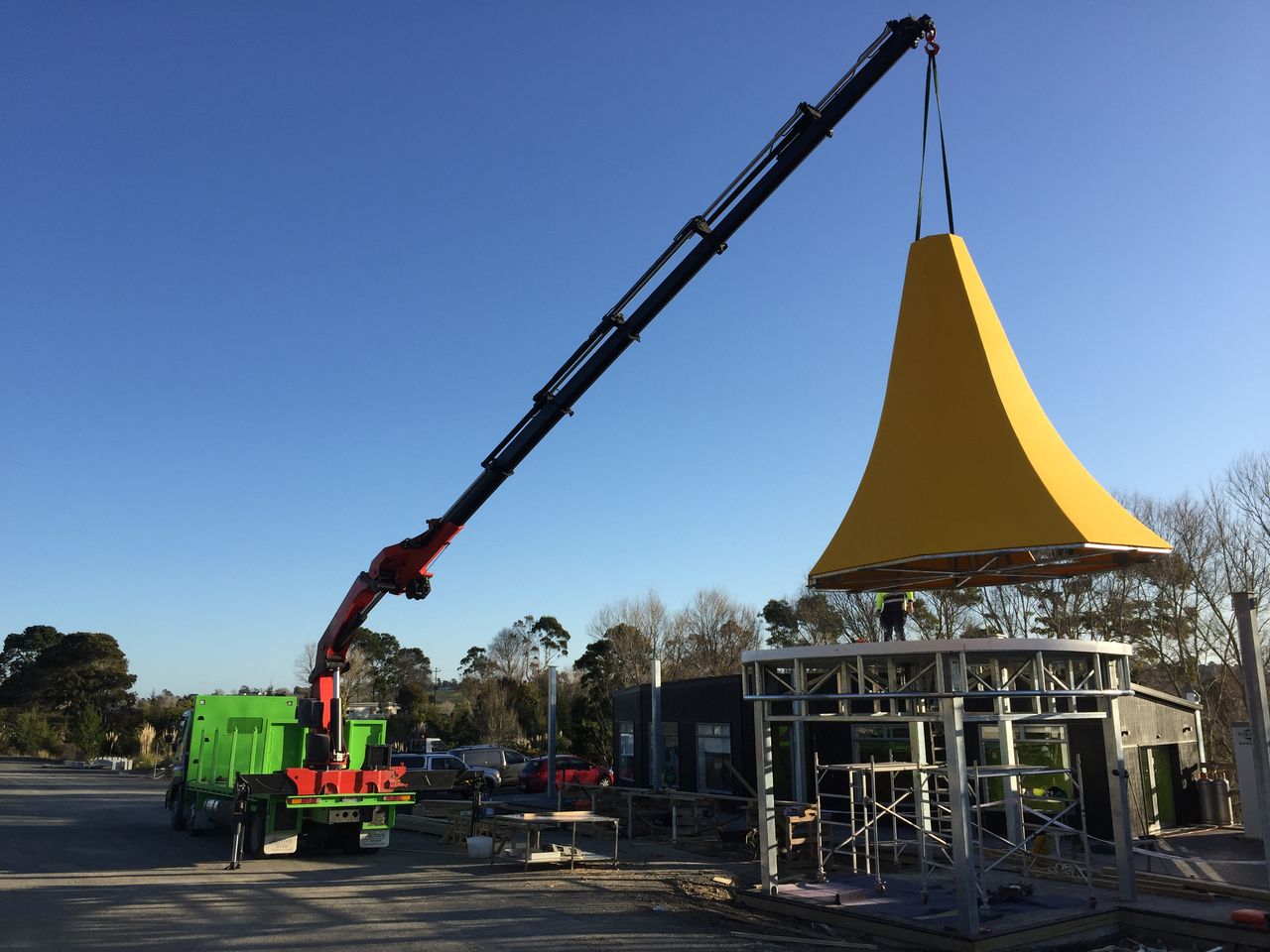A large shade sail structure placed on site.