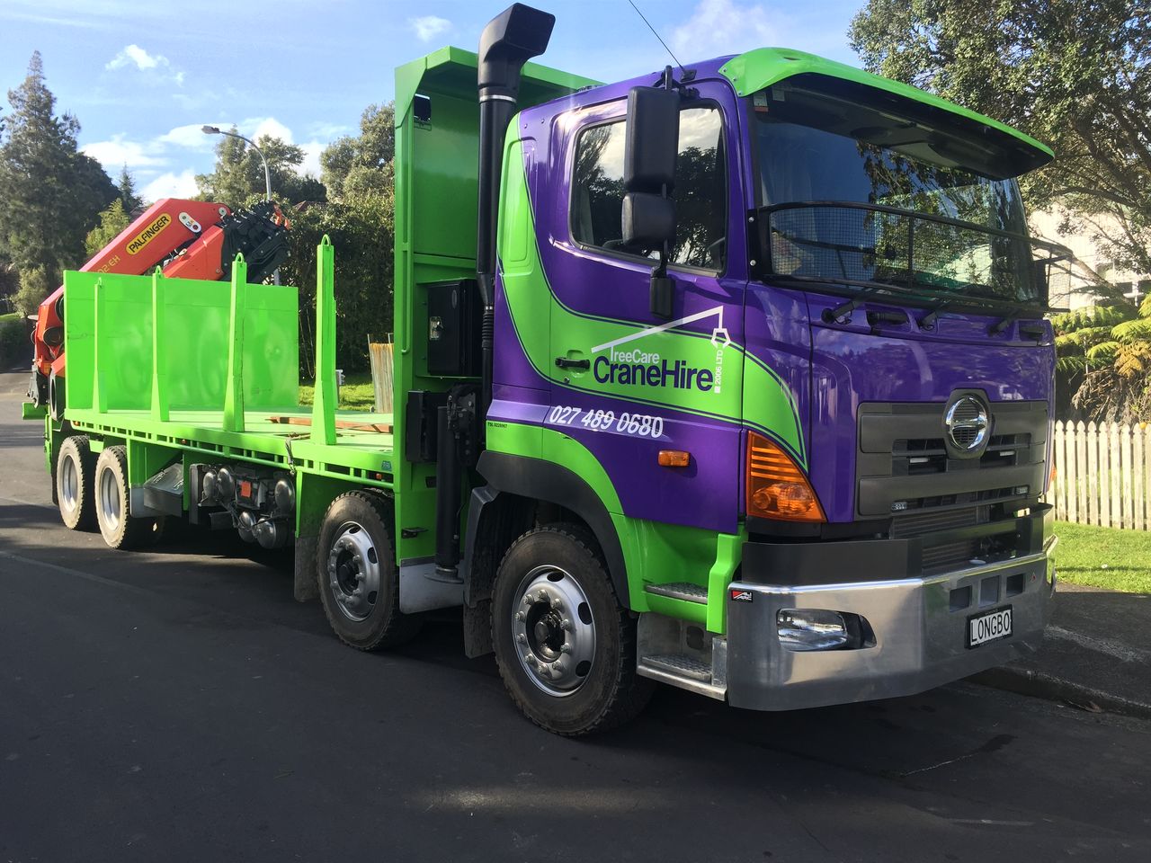 The TreeCare Crane Hire truck parked with the crane stowed